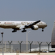 An Etihad plane landing at Abu Dhabi’s airport (Image: AP)
